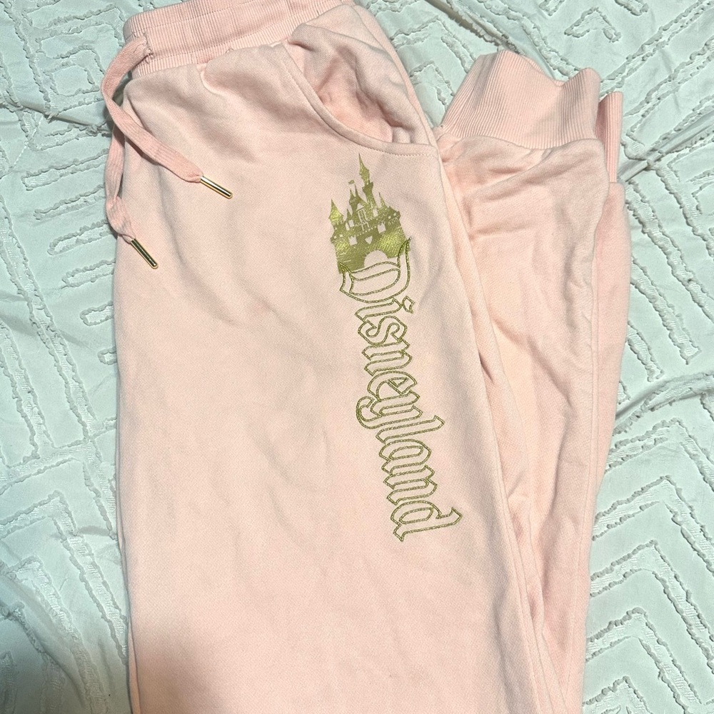 NWOT DISNEY Women's XS Peach
Pink Gold Castle Embroidered Joggers
